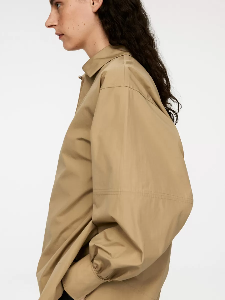 Shop ARKET Puff-Sleeve Blouse Beige