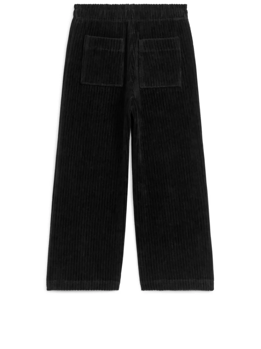 Shop ARKET Rib Velvet Trousers Black